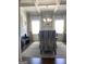 Beautiful dining area with modern chandelier, large windows, and stylish decor, perfect for gatherings at 160 Elysian Dr, Fayetteville, GA 30214