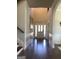 Welcoming foyer with hardwood floors, high ceilings, and white wainscoting throughout the entryway at 160 Elysian Dr, Fayetteville, GA 30214