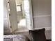 Open doorway leading to other parts of the house, featuring tile flooring and white trim at 160 Elysian Dr, Fayetteville, GA 30214