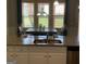 Open kitchen and dining area featuring granite countertops, modern appliances, and natural light at 160 Elysian Dr, Fayetteville, GA 30214