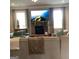 Inviting living area with stone fireplace, large windows, and plush seating for relaxation and entertainment at 160 Elysian Dr, Fayetteville, GA 30214