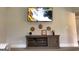 The room features a media console below a wall-mounted TV with decorative accents at 160 Elysian Dr, Fayetteville, GA 30214