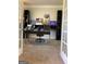 Chic home office with stylish decor, built-in shelving, and French door entryway at 160 Elysian Dr, Fayetteville, GA 30214