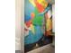 Close-up of a vibrant and colorful mural art wall, adding a unique and modern touch to the space at 160 Elysian Dr, Fayetteville, GA 30214