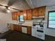 Bright kitchen boasting classic appliances, ample cabinetry, and plenty of counter space at 125 Rosenwald Cir, Stockbridge, GA 30281