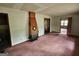 Spacious living room featuring a unique fireplace and neutral walls, ready for personalization at 125 Rosenwald Cir, Stockbridge, GA 30281