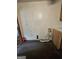 Utility room with a carpeted floor and a visible dryer duct installation at 125 Rosenwald Cir, Stockbridge, GA 30281