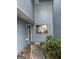 Charming front entrance showcasing a quaint walkway and vibrant green shrubbery at 8596 Creekwood Way, Jonesboro, GA 30238