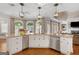 Gourmet kitchen featuring granite countertops, stainless steel appliances, and a spacious island at 660 Milton Dr, Mcdonough, GA 30252