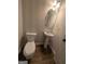 Powder room featuring a toilet and pedestal sink at 120 Magnaview Dr, Mcdonough, GA 30253