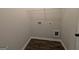The laundry room has hard surface flooring and utility connections at 120 Magnaview Dr, Mcdonough, GA 30253
