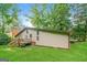 View of backyard featuring a wooden deck and beautiful green grass at 6290 Shallowford Way, Douglasville, GA 30135