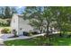 Spacious backyard with a patio, outdoor seating area, and lush green space for relaxation and entertainment at 127 Rockspray Rdg, Peachtree City, GA 30269