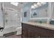 Bathroom featuring single vanity, shower-tub combo and light blue paint at 127 Rockspray Rdg, Peachtree City, GA 30269