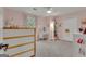 Bright bedroom with neutral carpet, window, vanity and stylish furnishings at 127 Rockspray Rdg, Peachtree City, GA 30269