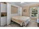 A room with a murphy bed, offering versatility and space-saving design, next to built-in cabinetry at 409 Brandy Ln, Mcdonough, GA 30253