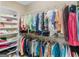 Spacious walk-in closet with custom shelving and plenty of hanging space for organized storage at 409 Brandy Ln, Mcdonough, GA 30253