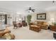 Spacious living room with an inviting atmosphere, fireplace, and open layout at 409 Brandy Ln, Mcdonough, GA 30253