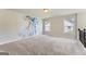 Bonus room with carpet, neutral walls, and natural light at 5915 Partners Pass, Cumming, GA 30028