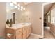A vanity has a white countertop and lots of storage in this bright and inviting bathroom at 85 London Ln, Sharpsburg, GA 30277