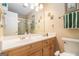 Bright bathroom with a single vanity, framed mirror, and a glass-enclosed shower at 85 London Ln, Sharpsburg, GA 30277