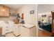 A functional laundry room with washer, dryer, and ample storage, conveniently located near the living area at 85 London Ln, Sharpsburg, GA 30277