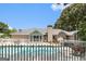 Backyard showcasing a sparkling pool, patio area, and manicured landscaping at 85 London Ln, Sharpsburg, GA 30277