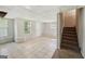 Finished basement with tile flooring, stairs and natural light at 2326 Sand Dollar Sw Ct, Atlanta, GA 30331