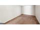 Empty basement room showcasing neutral-toned walls and carpeting, with outlets and base trim visible at 2326 Sand Dollar Sw Ct, Atlanta, GA 30331