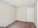 Cozy basement room featuring neutral carpet, a single window, and access door creating a versatile space at 2326 Sand Dollar Sw Ct, Atlanta, GA 30331