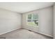Bedroom with a neutral interior and a window providing ample natural light at 2326 Sand Dollar Sw Ct, Atlanta, GA 30331