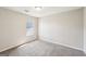 Bedroom with carpet, a window, and neutral walls allowing for customization at 2326 Sand Dollar Sw Ct, Atlanta, GA 30331