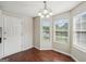 Charming dining area featuring wood floors, large windows, and a chandelier at 2326 Sand Dollar Sw Ct, Atlanta, GA 30331