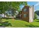A charming brick home featuring a spacious lawn, providing ample space for outdoor activities at 2326 Sand Dollar Sw Ct, Atlanta, GA 30331