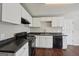 Kitchen featuring stainless steel appliances, bright white cabinets and sleek countertops at 2326 Sand Dollar Sw Ct, Atlanta, GA 30331