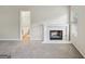 Living room with fireplace and a large open doorway at 2326 Sand Dollar Sw Ct, Atlanta, GA 30331