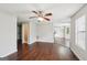 Inviting living room with ceiling fan and stylish hardwood floors at 2326 Sand Dollar Sw Ct, Atlanta, GA 30331