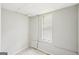 A bright room featuring painted walls, a window with blinds, and neutral accents at 2326 Sand Dollar Sw Ct, Atlanta, GA 30331