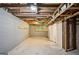 Unfinished basement featuring concrete floor and the exposed ceiling is ready for customization at 4496 Housworth Dr, Lithonia, GA 30038