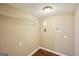 This utility room has basic connections and shelving, ideal for laundry appliances and storage solutions at 4496 Housworth Dr, Lithonia, GA 30038