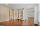 Large bonus room/flex space with hardwood flooring and built-in bookshelves at 1186 Village Ne Cv, Atlanta, GA 30319