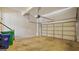 Spacious two-car garage with concrete floor and white walls, ample for parking and storage at 1186 Village Ne Cv, Atlanta, GA 30319