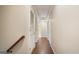 Hallway with hardwood floors and neutral paint at 1186 Village Ne Cv, Atlanta, GA 30319