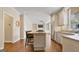Spacious kitchen featuring a large island with seating and modern stainless steel appliances at 1186 Village Ne Cv, Atlanta, GA 30319