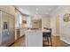 Bright kitchen boasting a large island, modern appliances, and ample cabinet space at 1186 Village Ne Cv, Atlanta, GA 30319