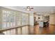 Open concept kitchen flowing into the living area, featuring a large island and stainless appliances at 1186 Village Ne Cv, Atlanta, GA 30319