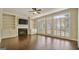 Inviting living room with built-in shelves, fireplace, and natural light from the french doors at 1186 Village Ne Cv, Atlanta, GA 30319