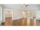 This expansive main bedroom features hardwood floors, trey ceilings, and ensuite bathroom and walk-in closet access at 1186 Village Ne Cv, Atlanta, GA 30319