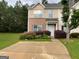 Charming two-story home with front lawn and driveway at 737 Outlook Way, Atlanta, GA 30349