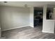 Living room featuring gray walls, grey flooring, and modern lighting at 737 Outlook Way, Atlanta, GA 30349
